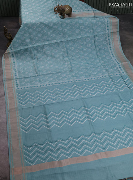 Maheshwari silk cotton saree pastel blue with allover floral butta block prints and thread woven border