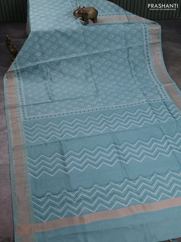 Maheshwari silk cotton saree pastel blue with allover floral butta block prints and thread woven border