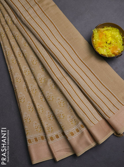 Maheshwari silk cotton saree beige with allover floral butta block prints and thread woven border