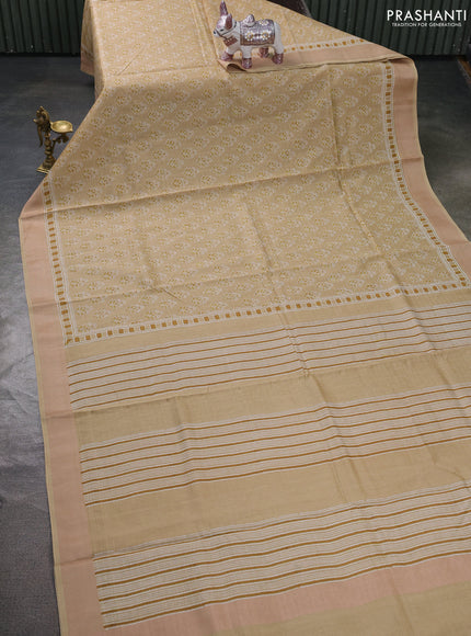 Maheshwari silk cotton saree beige with allover floral butta block prints and thread woven border