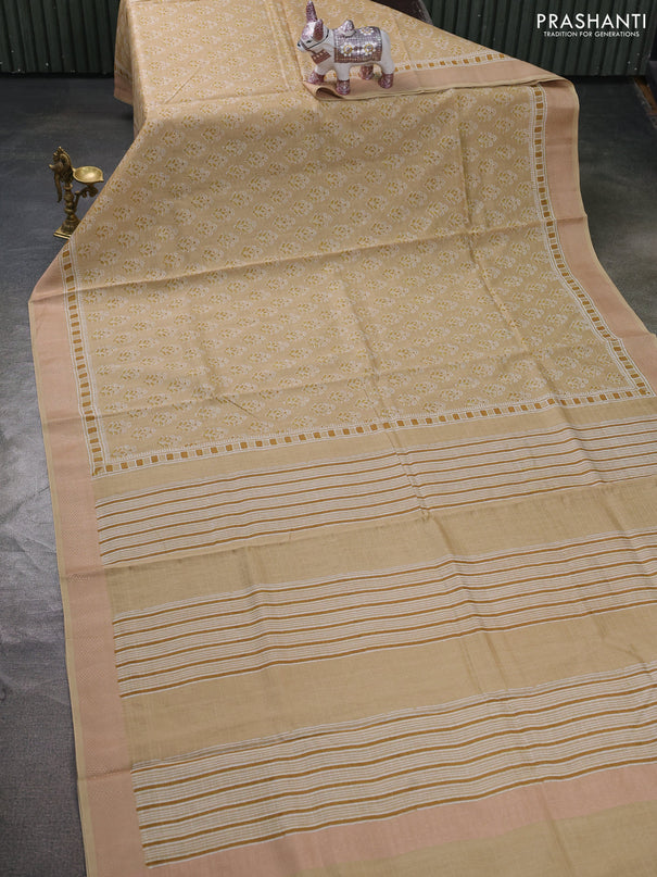 Maheshwari silk cotton saree beige with allover floral butta block prints and thread woven border
