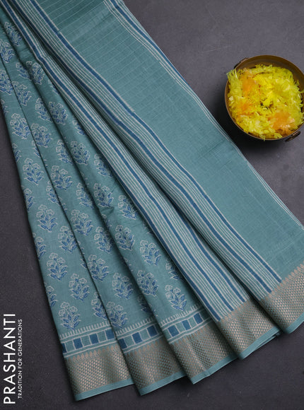 Maheshwari silk cotton saree pastel blue with allover floral butta block prints and thread woven border