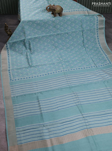 Maheshwari silk cotton saree pastel blue with allover floral butta block prints and thread woven border