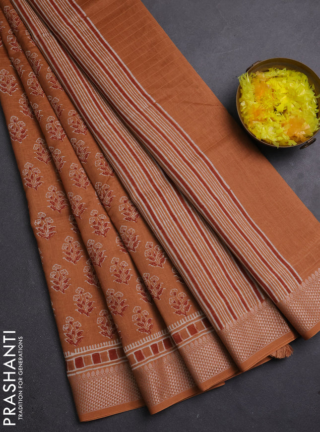 Maheshwari silk cotton saree rust shade with allover floral butta block prints and thread woven border