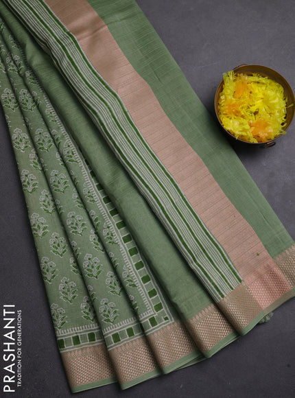 Maheshwari silk cotton saree pastel green with allover floral butta block prints and thread woven border