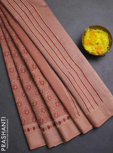 Maheshwari silk cotton saree pastel peach shade with allover floral butta block prints and thread woven border
