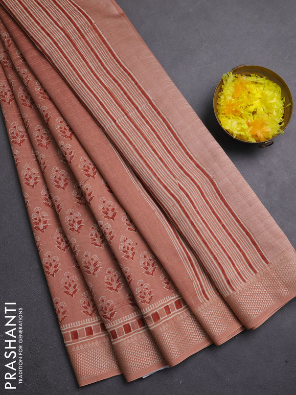 Maheshwari silk cotton saree pastel peach shade with allover floral butta block prints and thread woven border