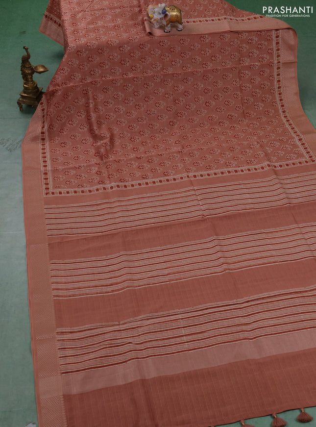 Maheshwari silk cotton saree pastel peach shade with allover floral butta block prints and thread woven border