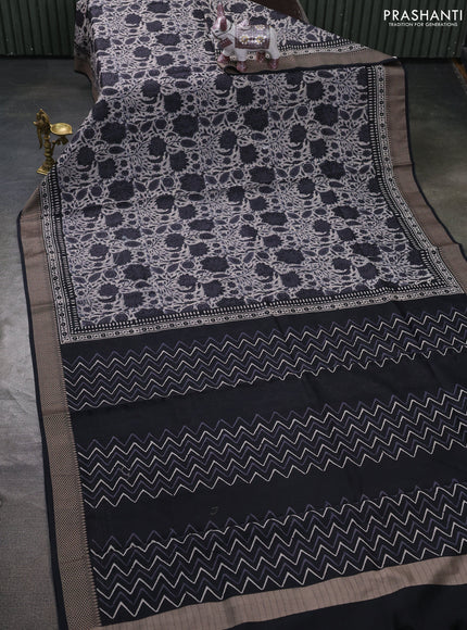 Maheshwari silk cotton saree off white and black with allover floral block prints and thread woven border