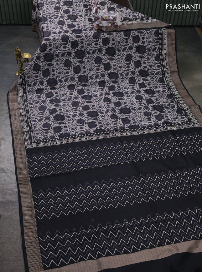 Maheshwari silk cotton saree off white and black with allover floral block prints and thread woven border