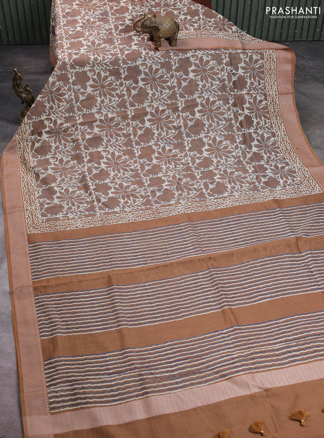 Maheshwari silk cotton saree beige and dark mustard with allover kalamkari block prints and thread woven border