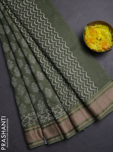 Maheshwari silk cotton saree pastel green with allover floral butta block prints and thread woven border