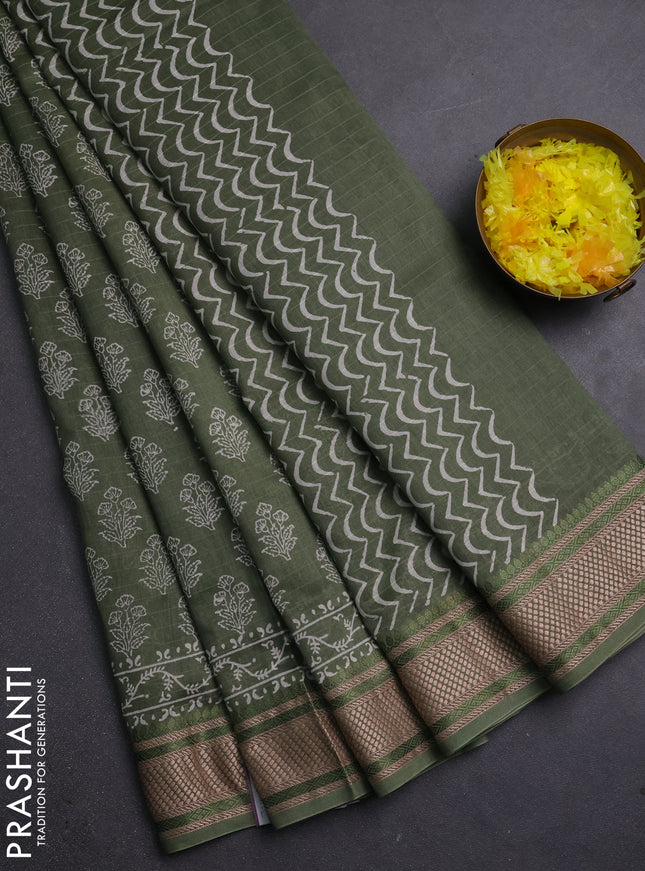Maheshwari silk cotton saree pastel green with allover floral butta block prints and thread woven border