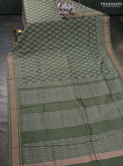 Maheshwari silk cotton saree pastel green with allover floral butta block prints and thread woven border