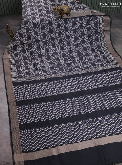 Maheshwari silk cotton saree beige and black with allover kalamkari block prints and thread woven border