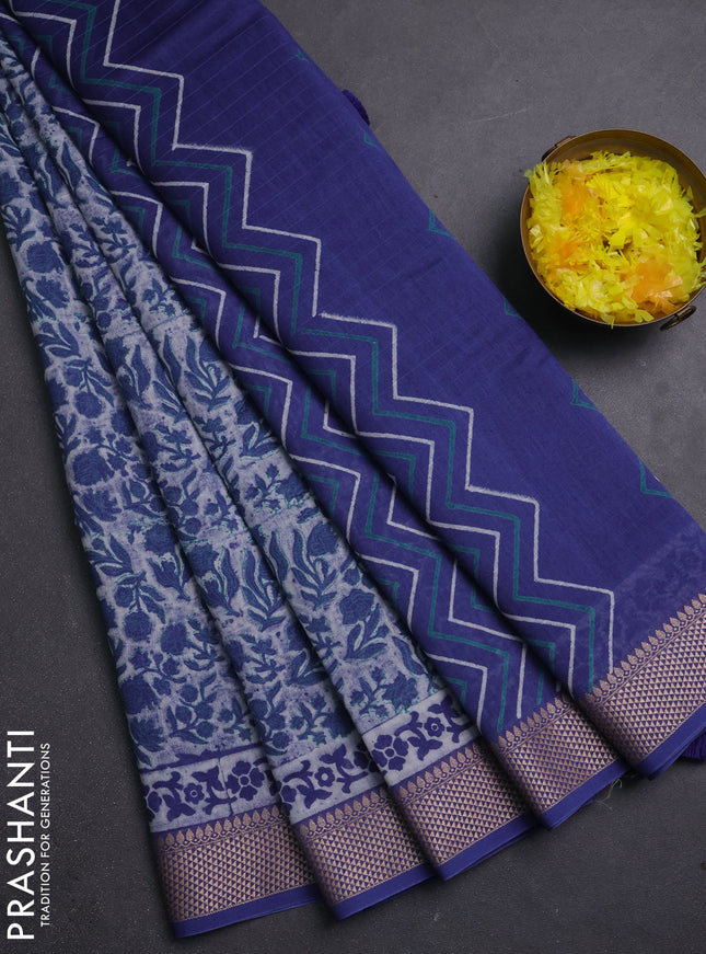 Maheshwari silk cotton saree off white and blue with allover block prints and thread woven border