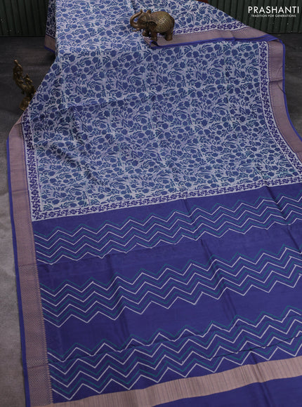 Maheshwari silk cotton saree off white and blue with allover block prints and thread woven border