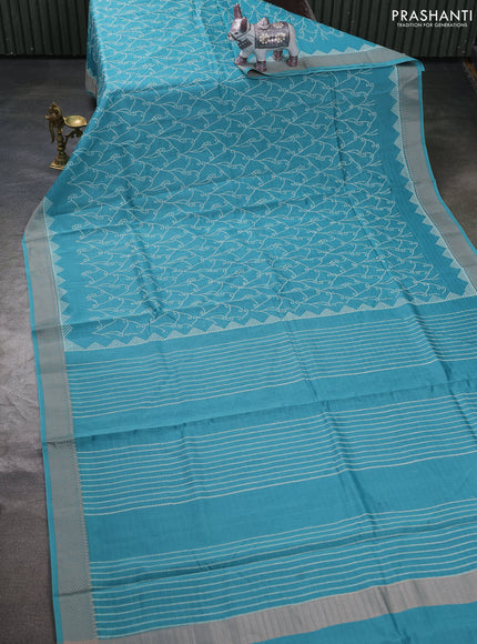 Maheshwari silk cotton saree teal green with allover block prints and thread woven border
