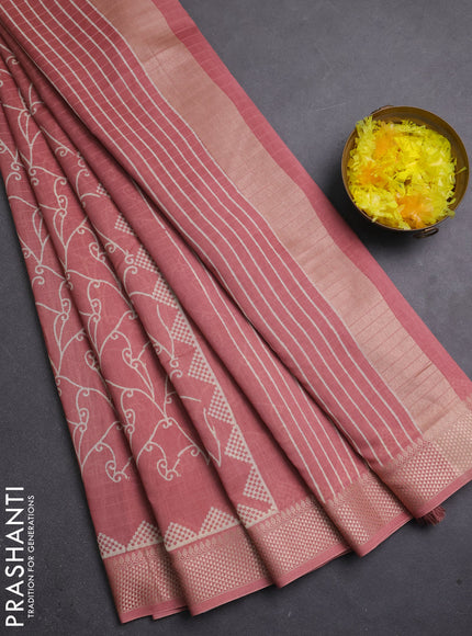 Maheshwari silk cotton saree pastel peach with allover block prints and thread woven border