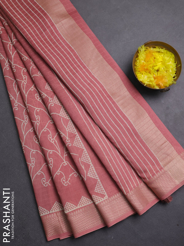 Maheshwari silk cotton saree pastel peach with allover block prints and thread woven border