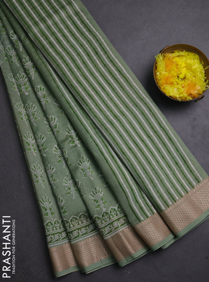 Maheshwari silk cotton saree pastel green shade with allover butta block prints and thread woven border