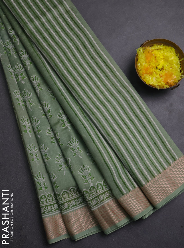 Maheshwari silk cotton saree pastel green shade with allover butta block prints and thread woven border