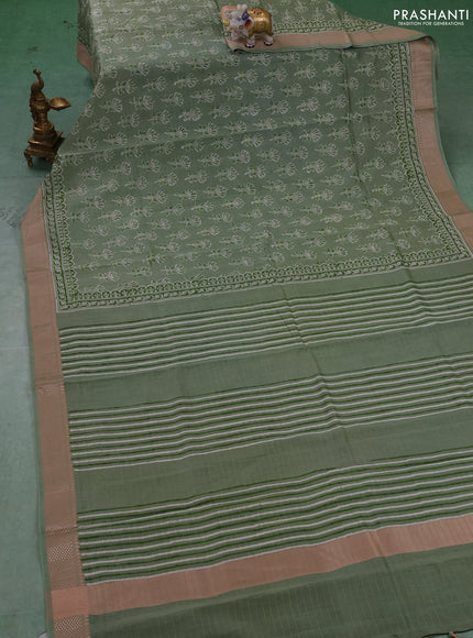 Maheshwari silk cotton saree pastel green shade with allover butta block prints and thread woven border