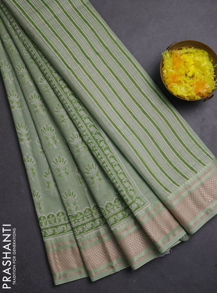 Maheshwari silk cotton saree pastel green with allover butta block prints and thread woven border