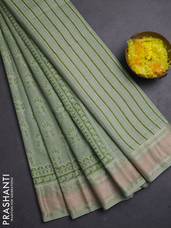 Maheshwari silk cotton saree pastel green with allover butta block prints and thread woven border