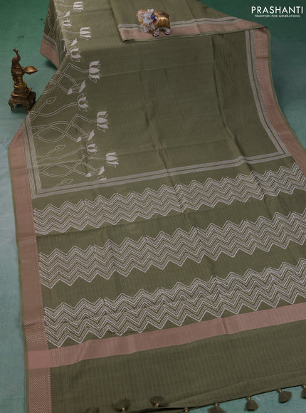 Maheshwari silk cotton saree pastel green with floral block prints and thread woven border
