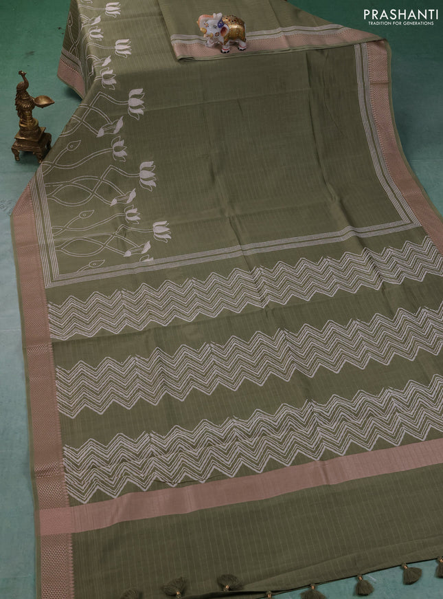 Maheshwari silk cotton saree pastel green with floral block prints and thread woven border