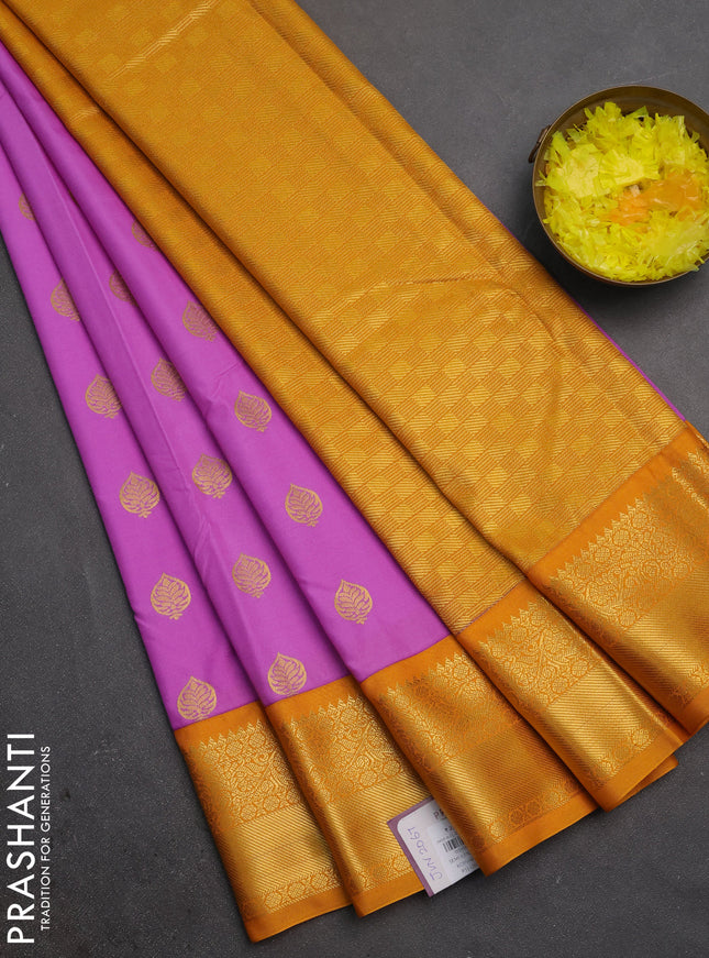Semi kanchipuram silk saree lavender and mustard yellow with allover zari woven buttas and zari woven korvai border