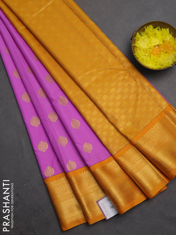 Semi kanchipuram silk saree lavender and mustard yellow with allover zari woven buttas and zari woven korvai border