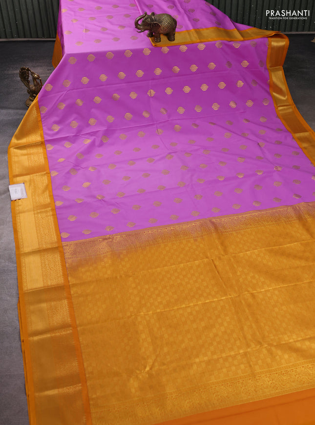 Semi kanchipuram silk saree lavender and mustard yellow with allover zari woven buttas and zari woven korvai border