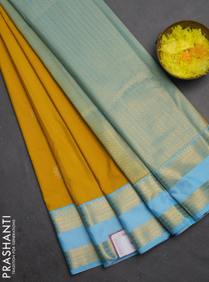 Semi kanchipuram silk saree mustard yellow and teal blue with zari woven buttas and rettapet zari woven border