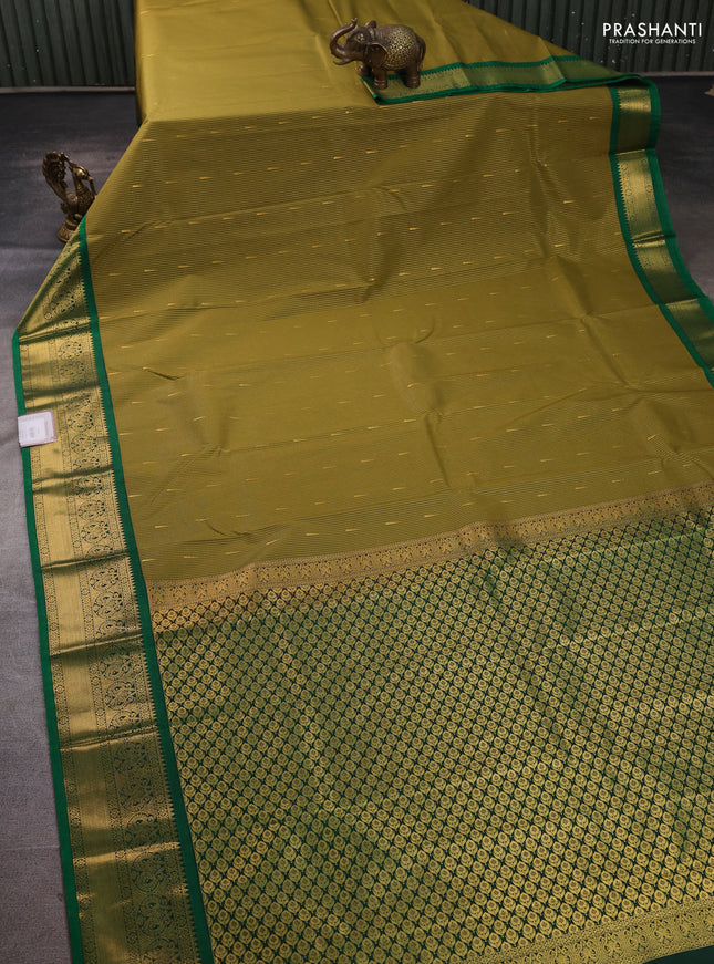Semi kanchipuram silk saree mehendi green and green with allover zari weaves & buttas and zari woven border