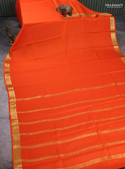 Pure mysore silk saree orange with plain body and zari woven border
