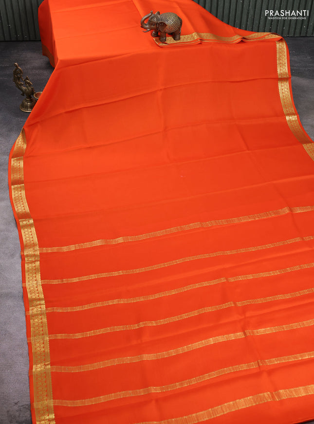Pure mysore silk saree orange with plain body and zari woven border
