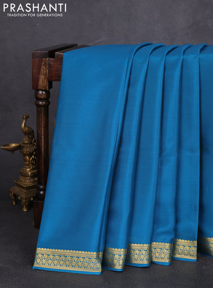 Pure mysore silk saree peacock blue with plain body and zari woven border