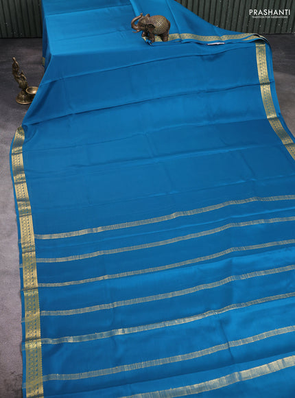 Pure mysore silk saree peacock blue with plain body and zari woven border