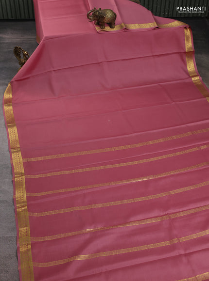 Pure mysore silk saree pastel peach with plain body and zari woven border