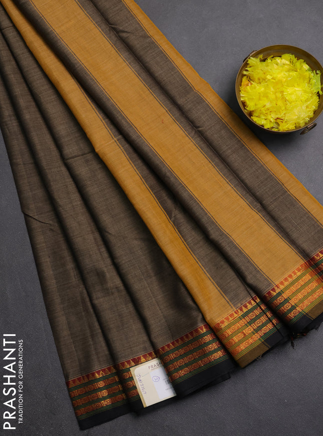 Narayanpet cotton saree chikku shade and black with plain body and zari woven border