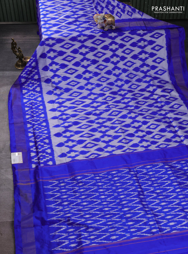 Pochampally silk saree off white and blue with allover ikat weaves and ikat zari woven border