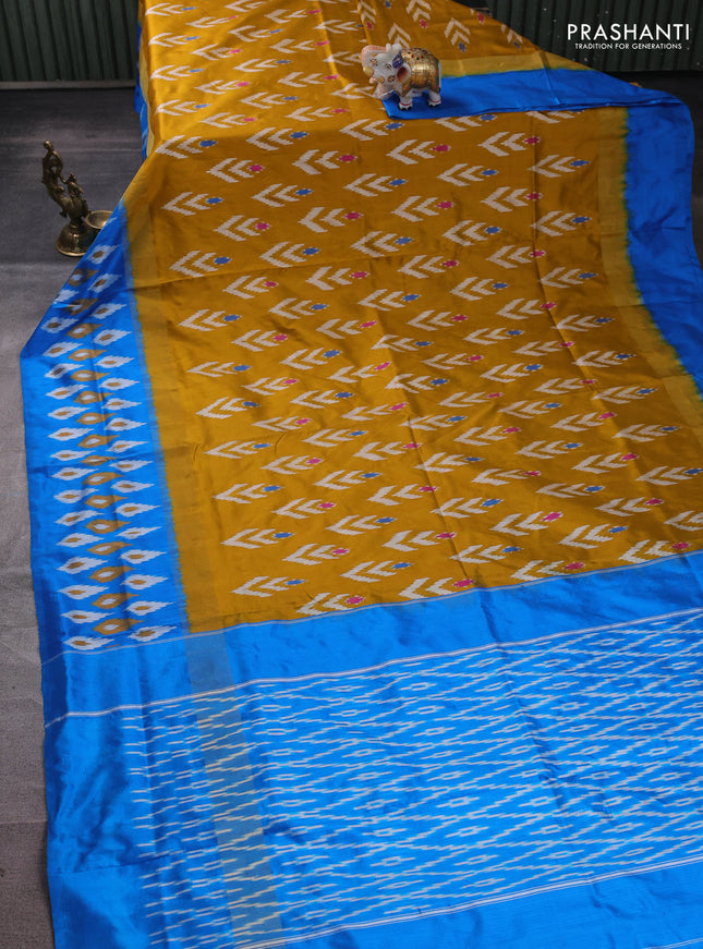 Pochampally silk saree dark mustrard and cs blue with allover ikat woven buttas and ikat zari woven border