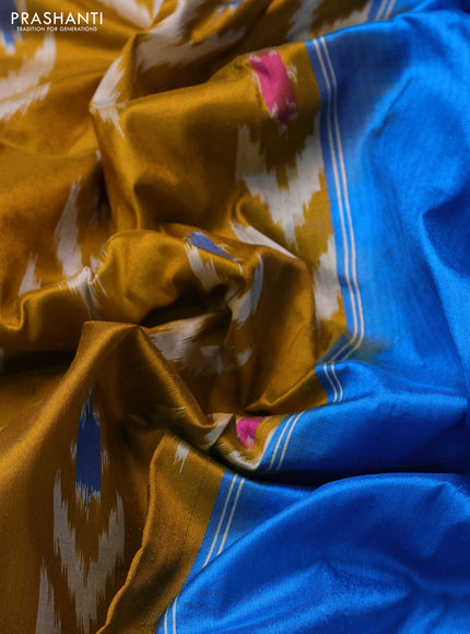 Pochampally silk saree dark mustrard and cs blue with allover ikat woven buttas and ikat zari woven border