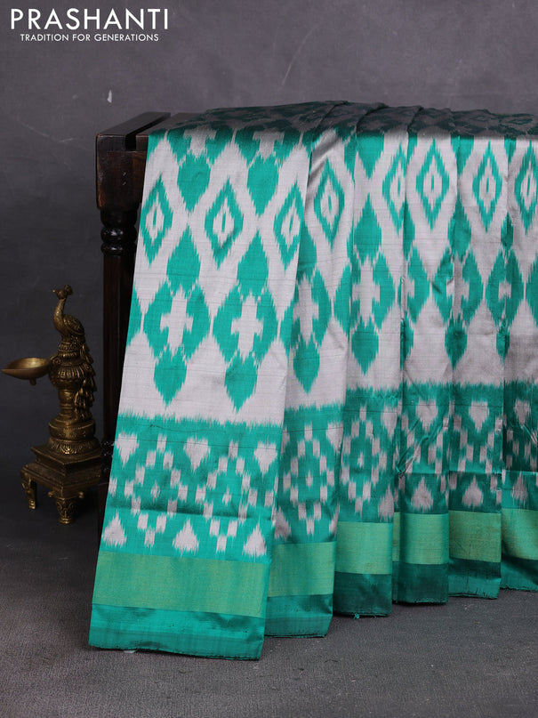 Pochampally silk saree grey and teal green with allover ikat weaves and ikat zari woven border