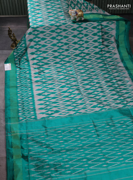 Pochampally silk saree grey and teal green with allover ikat weaves and ikat zari woven border