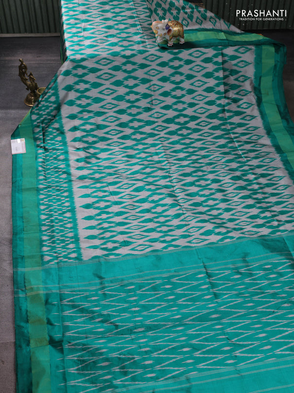 Pochampally silk saree grey and teal green with allover ikat weaves and ikat zari woven border