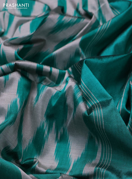 Pochampally silk saree grey and teal green with allover ikat weaves and ikat zari woven border