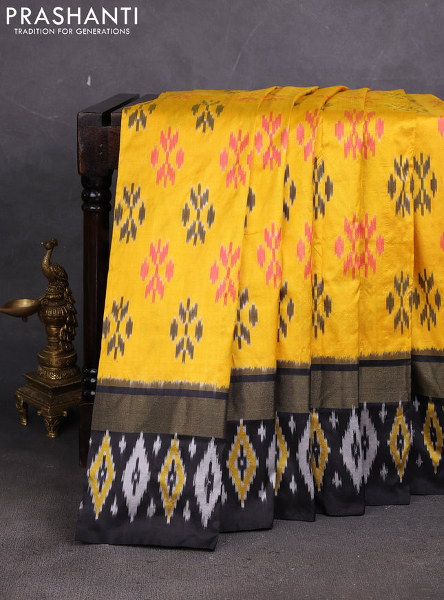 Pochampally silk saree yellow and black with allover ikat weaves and ikat zari woven border